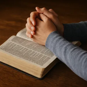 Praying Hands with Open Bible – The Power of Intercessory Prayer | This Time on Purpose Hands folded in prayer over an open Bible, symbolizing intercessory prayer and praying for others.
